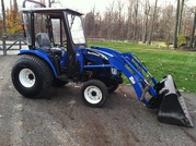 2006 New Holland TC33D 4WD loader snow blower